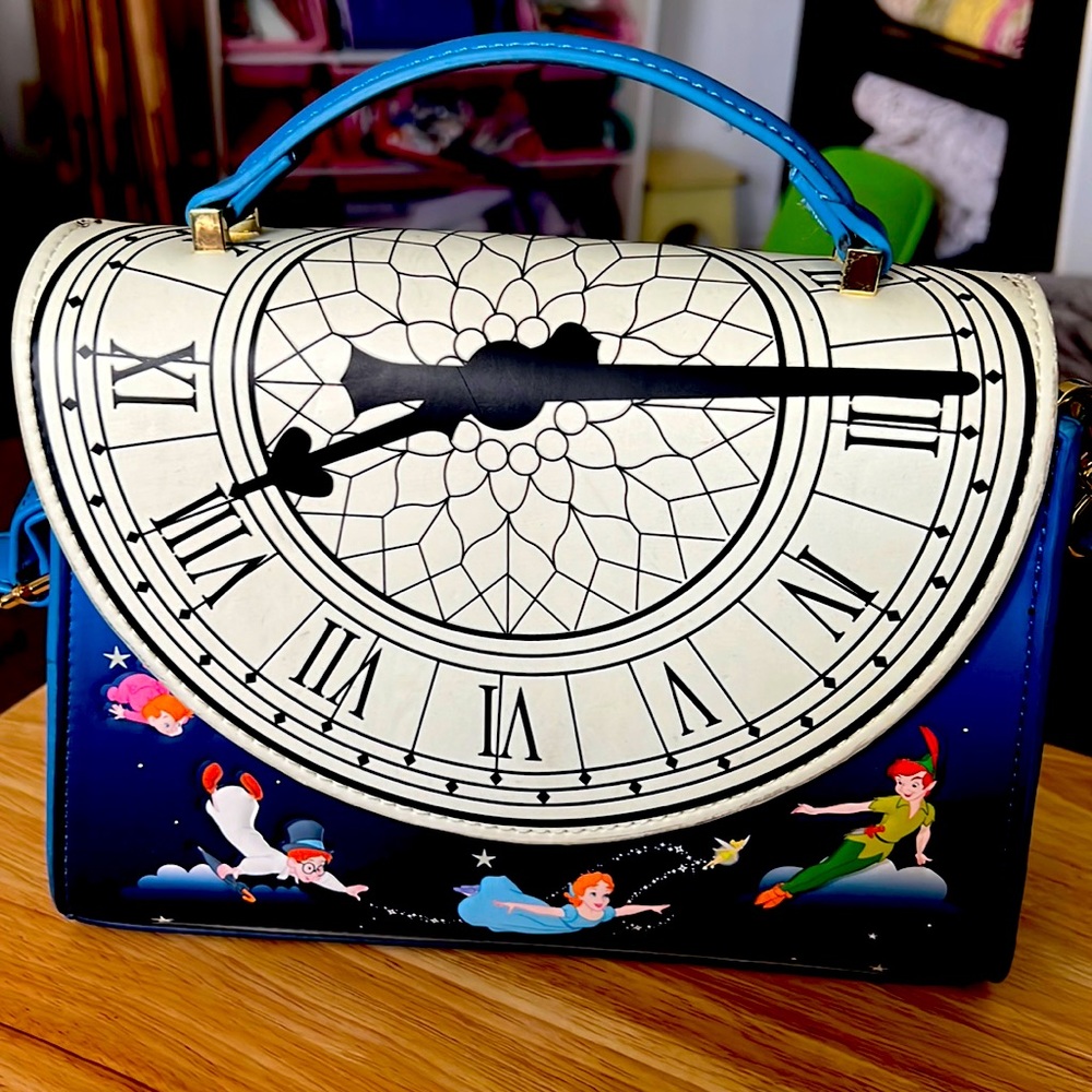 Peter Pan “Think Happy Thoughts” Disney Loungefly glows in the dark